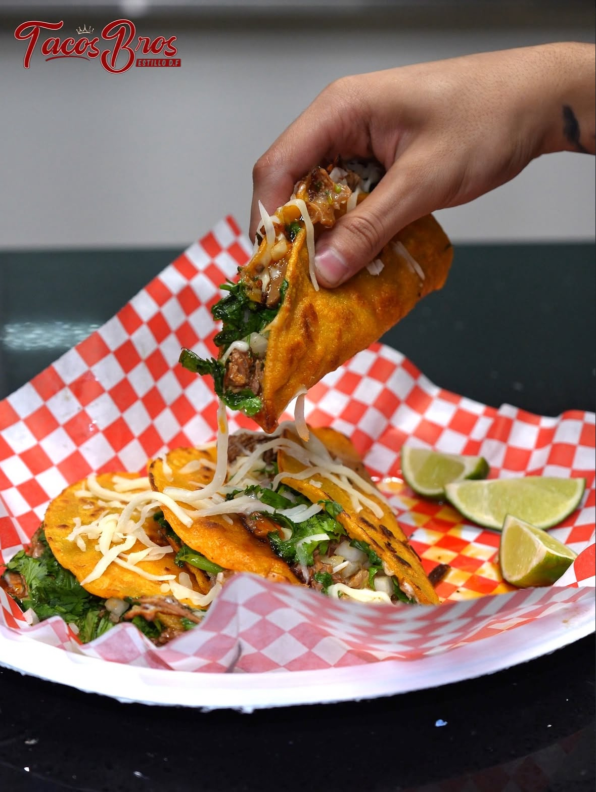 Carne Asada Tacos — grilled steak, cilantro, onion and salsa on hand-pressed corn tortillas